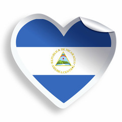Heart sticker with flag of Nicaragua isolated on white