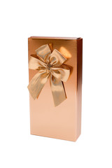 Golden gift box with golden ribbon on white background