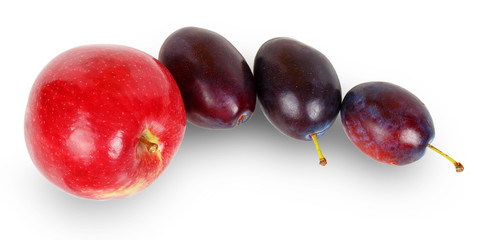 Red apple and three plums