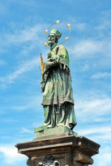 Fototapeta premium St. John of Nepomuk statue on Charles bridge of Prague