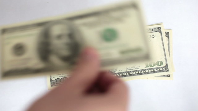 Man is counting his money close-up