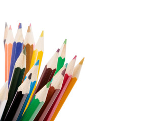 Drawing supplies: assorted color pencils, isolated on white back