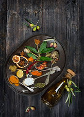 Colorful assortment of  spices and olive oil