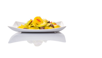 Pickled young mango with dried tamarind and chili slices
