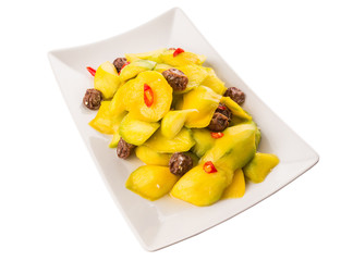 Pickled young mango with dried tamarind and chili slices