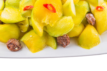 pickled young mango with dried tamarind and chili slices
