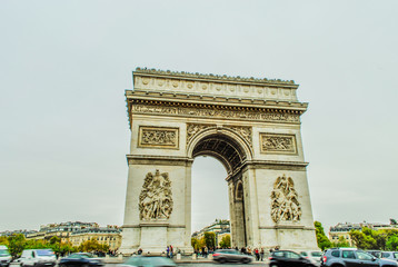 Fototapeta na wymiar Arc de Triomphe from Avenue des Champs-Elysees