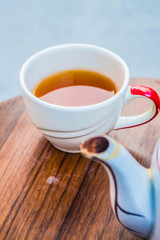 Drinking a glass of tea