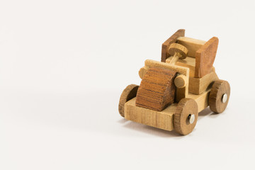 Wooden toy car miniature isolated on white background