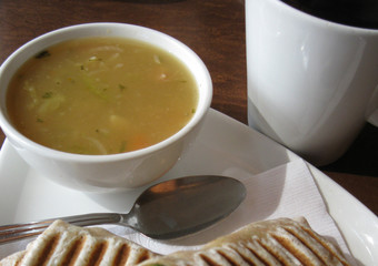Homemade chicken noodle soup with wrap for lunch
