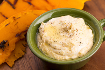 A bowl of creamy hummus