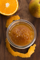 glass of pear jam with orange