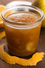 glass of pear jam with orange