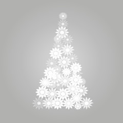 Abstract vector christmas tree from white snowflakes