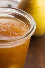 glass of pear jam with orange