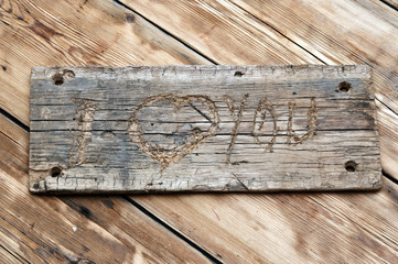 Wooden planks background with heart shape