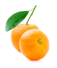 Ripe tangerine with leaf.
