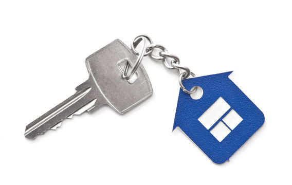 silver keys with house figure on the white background