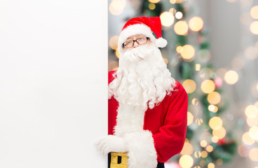 man in costume of santa claus with billboard