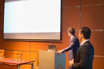 Public speaker at Business Conference.