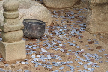 Many coins on the ground