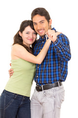 cute young couple happy hugging holding key