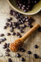 Sugar Stick Cinnamon and coffee bean on wooden table