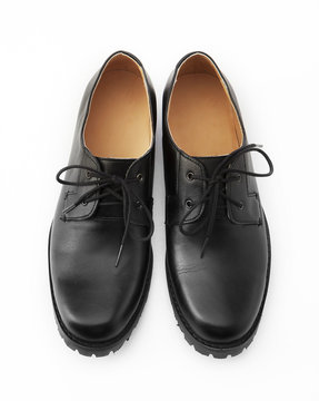 Black leather shoe isolated
