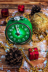 postcard with green old-fashioned clock and Christmas ornaments