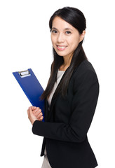 Businesswoman with clipboard