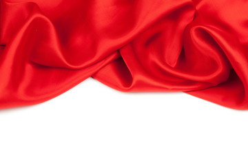 Red satin fabric against white background