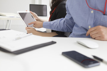 Fototapeta premium And turned around, businessman touching the tablet