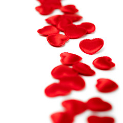 Felt red hearts isolated on a white background