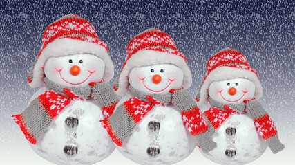 schneemannfamilie auf urlaub