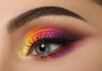 Obraz premium Woman eye with beautiful colourful makeup