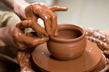 potter, creating an earthen jar