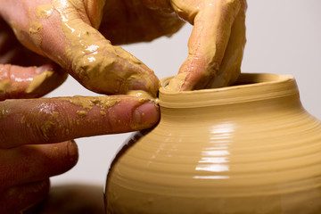 potter, creating an earthen jar