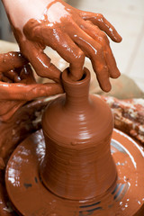 potter, creating an earthen jar