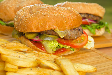 Tasty burger with melted cheese and thick succulent ground beef