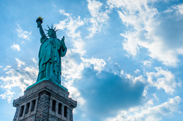 Fototapeta premium Lady Liberty, Statue of Liberty and clouds