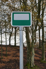 Green and White Traffic Sign