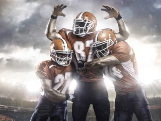 Foto op Plexiglas American football players in action on stadium © 103tnn