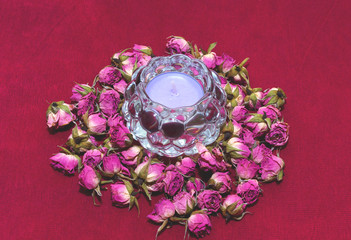 Beautiful composition with candle and roses