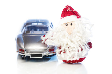 Santa Claus or Father Frost with old retro car