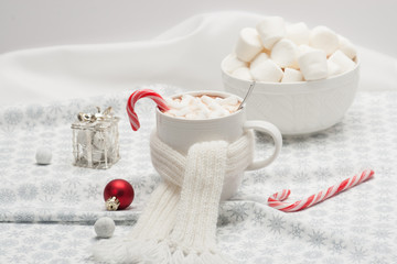 Obraz na płótnie Canvas Mug Of Hot Chocolate With Scarf. Marshmallows And Sweets. Christ