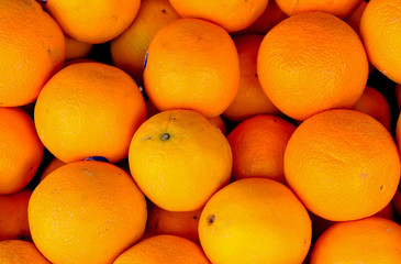 many fresh raw orange background