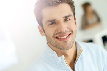Fototapeta premium Portrait of young smiling man