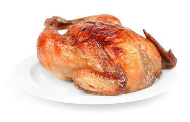 Delicious baked chicken on plate isolated on white