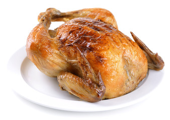 Delicious baked chicken on plate isolated on white