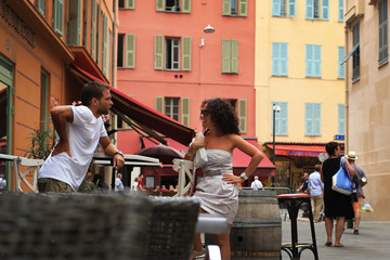 Young couple talking in a summer caf√© in nice